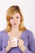 Young woman with a coffee mug Young woman with a coffee mug