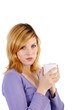 Young woman with a coffee mug (white background) Young woman with a coffee mug (white background)