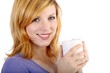 Young woman with a coffee mug (white background) Young woman with a coffee mug (white background)