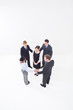 Four businesspeople circling businesswoman