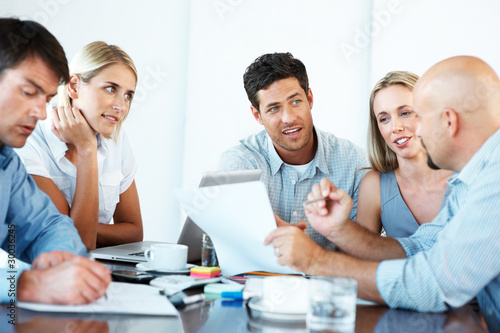 Foto: Group of business colleague working together Group of business colleague working together