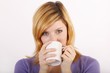 Young woman with a coffee mug Young woman with a coffee mug