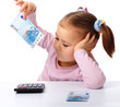 Little girl with few paper euro banknotes