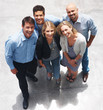 Happy group of business people standing together
