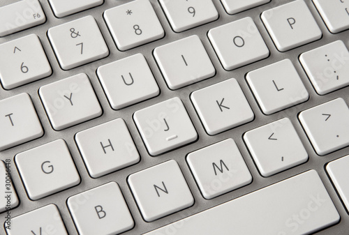 Photo: Modern white computer keyboard Modern white computer keyboard