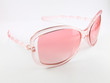 Pink sunglasses isolated on white