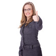 Businesswoman standing with thumb up