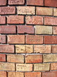 Bricks with messages on the round wall