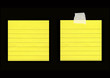 Photo: Yellow lined post-its isolated on black Yellow lined post-its isolated on black