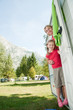 Little girl with mother in camper