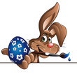 easter bunny with painted blue egg