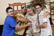 Horseplay Three young men beating up an older man
