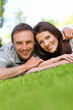Photo: Couple lying down in the garden Couple lying down in the garden