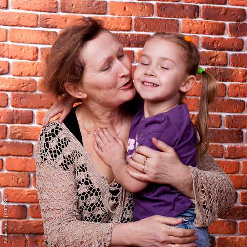 Photo: Grandmother and her grand daughter Grandmother and her grand daughter