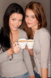 Foto: girlfriends trinking some coffee girlfriends trinking some coffee
