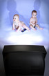 kids in front of tv