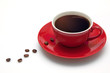 Red coffee cup and grain on white background
