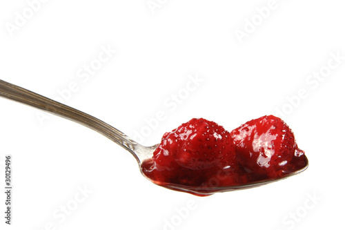 Photo: defrosted strawberries on spoon defrosted strawberries on spoon