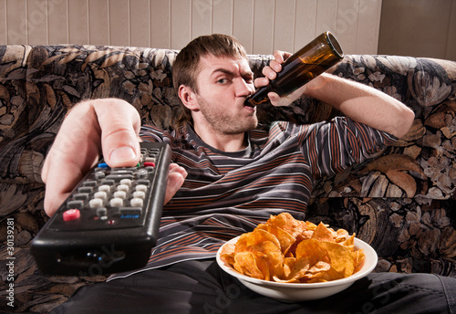 Photo: Man watching TV Man watching TV