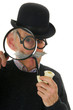 Photo: Inspector with magnifier Inspector with magnifier