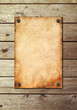 Vintage page on a wooden wall Vintage page on a wooden wall