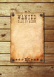 Vintage wanted poster on a wooden wall Vintage wanted poster on a wooden wall