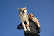 Man playing with dog