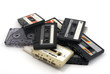 Old audio tape cassettes on white background