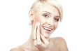 calm beauty portrait of a smiling young woman putting cream calm beauty portrait of a smiling young woman putting cream