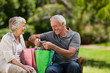 Retired couple with shopping bags