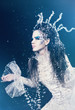 Photo: Beautiful brunette in a dress of Snow Queen Beautiful brunette in a dress of Snow Queen