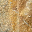 texture of yellow stone,stone wall background