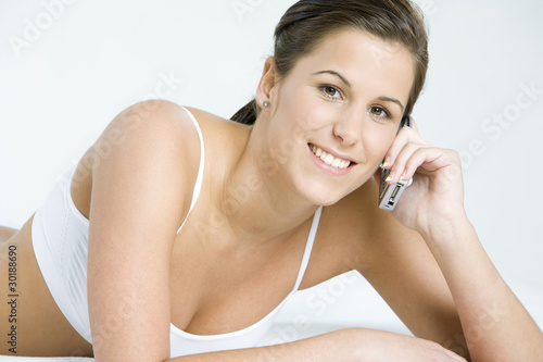 Photo: portrait of telephoning woman portrait of telephoning woman