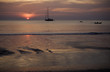 Photo: Sun Setting over the sea and boats in Thailand Sun Setting over the sea and boats in Thailand
