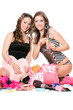 Two pretty girls blow bubbles. Isolated