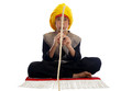 boy playing the flute charming a rope