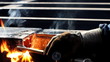 Worker cutting metal with a flame