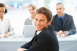 Business man smiling during interview Business man smiling during interview