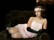 The girl in style 30 on an armchair The girl in style 30 on an armchair