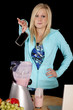 Woman dropping cell phone blender