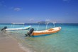 boats in caribbean beach turquoise sea