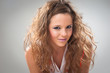 beautiful fashion young smiling girl with makeup and coiffure