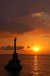 Sunset at Sevastopol harbor, monument to scuttled Russian ship