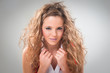 portrait of attractive blond girl with makeup and coiffure