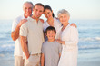 Portrait of a smiling family at the beach Portrait of a smiling family at the beach