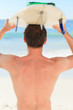 Man with his surfboard