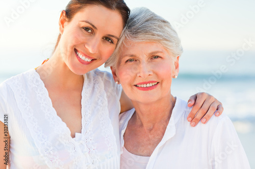 Photo: Smiling daughter with her mother Smiling daughter with her mother