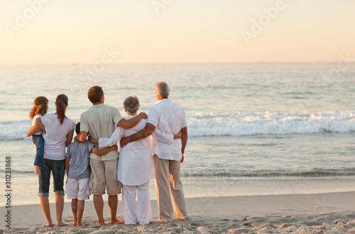 Photo: Beautiful family at the beach Beautiful family at the beach