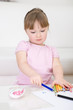 young girl drawing