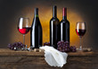 still life with red wine and drapery